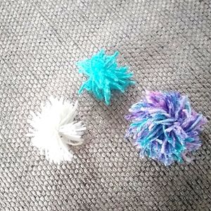 Shaggy pom poms